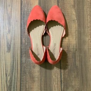 Restricted suede flats